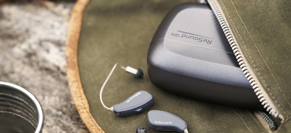 ReSound LiNX Quattro hearing aids and charging case.jpg