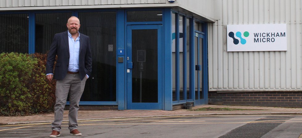 Rob Tunrer in front of building.png